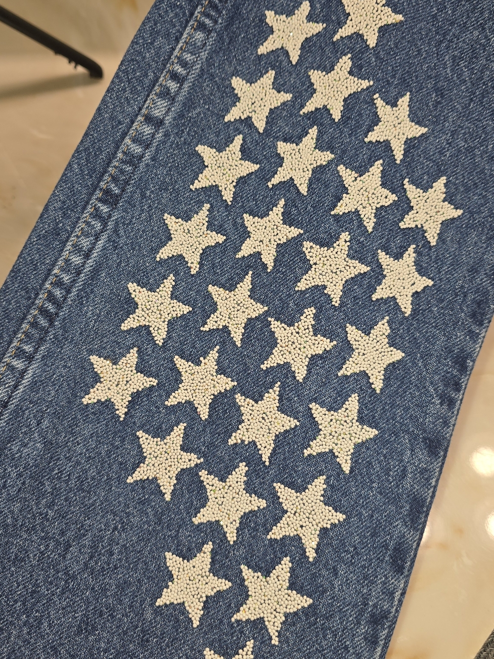 Size 27 Wrangler Blue Straight-Leg Jeans with Beaded Star Appliqués